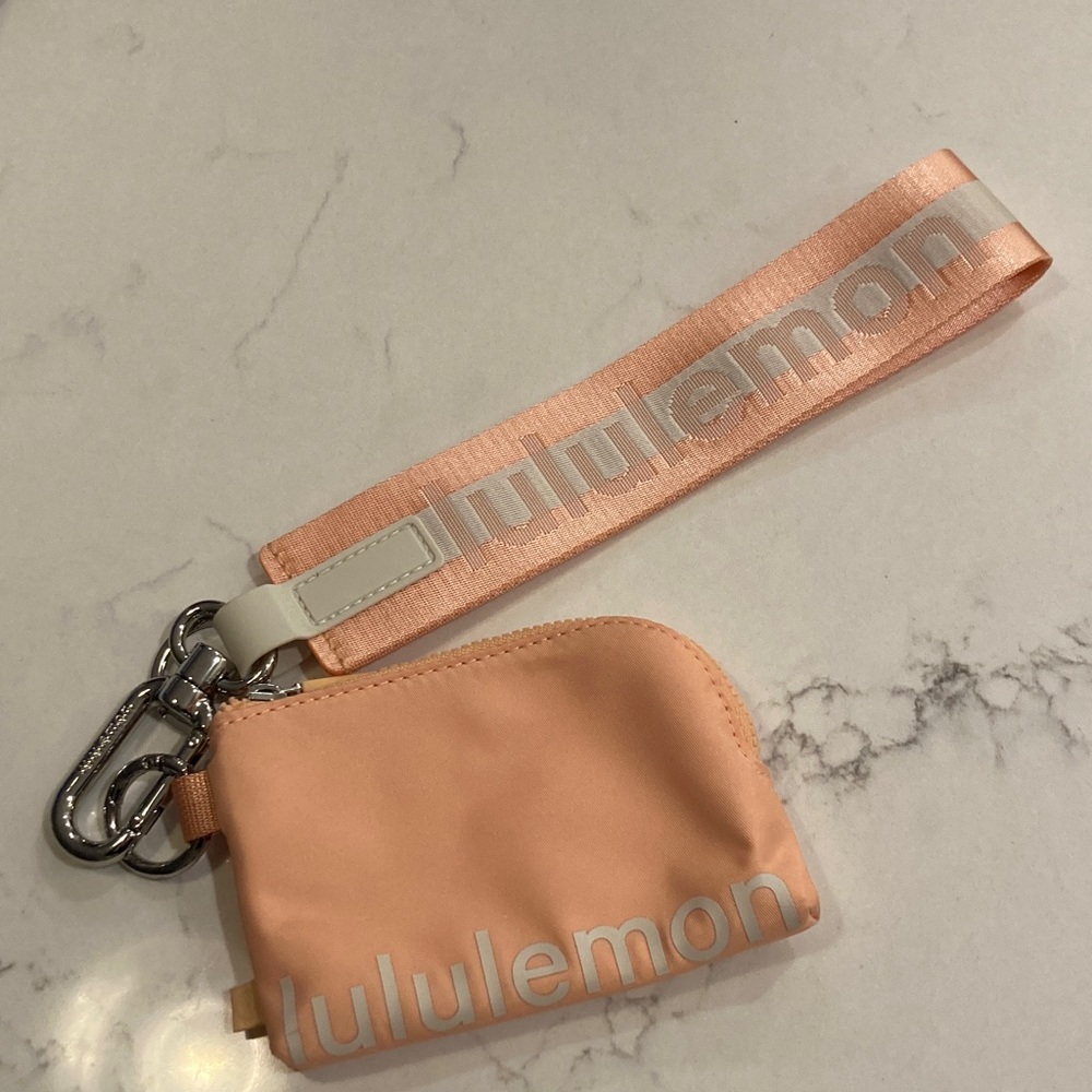 Lululemon Athletica Peach Wristlet with Silver Accents
